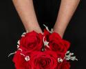 This beautiful red prom bouquet has great crystal accents that really pop against the red flowers.